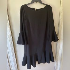 Calvin Klein tulip quarter sleeve black dress and ruffled bottom.